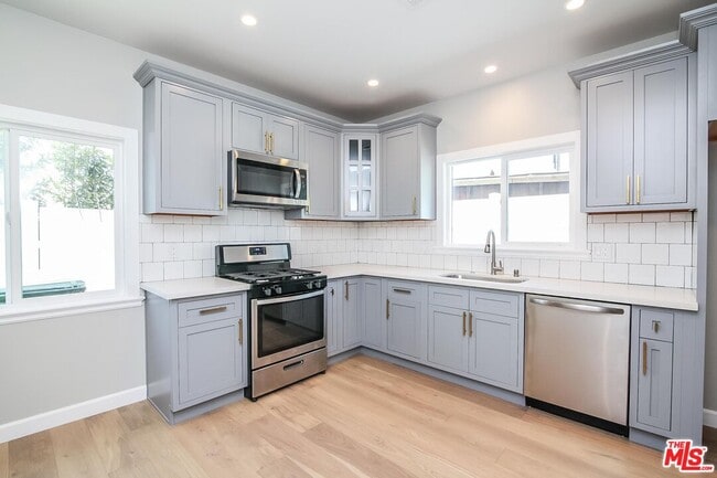 Building Photo - 1239 S Highland Ave