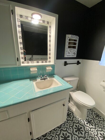 Vanity/sink area with custom tile work - 2101 Palmore Rd
