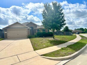 Building Photo - COMING SOON! Greenbelt Views & Giant Yard — Freshly Painted 4BR in Golden Pond