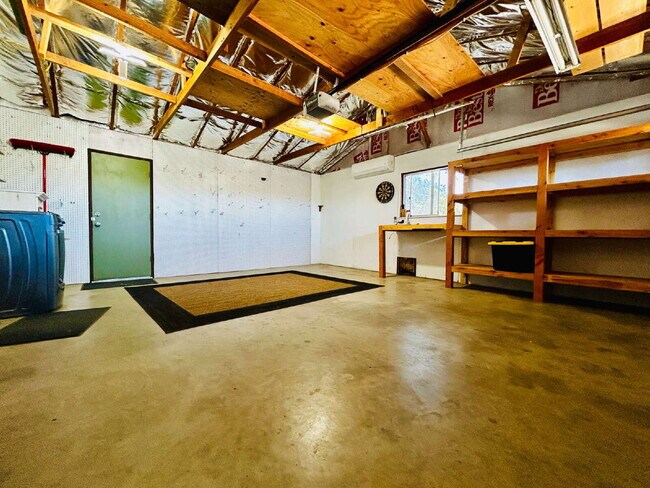 Building Photo - Spacious 2 bd, 2 ba with attached finished garage