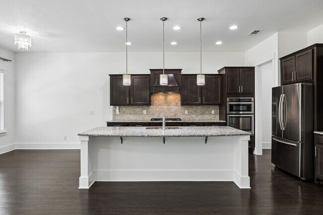 Building Photo - Available now in highly desirable Amelia Park! Beautifully maintained 5-bedroom, 3.5-bath home
