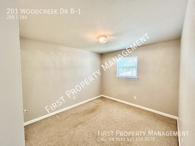 Building Photo - 201 Woodcreek Dr