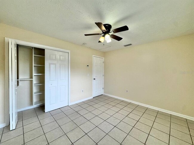 Building Photo - 10015 N Aster Ave