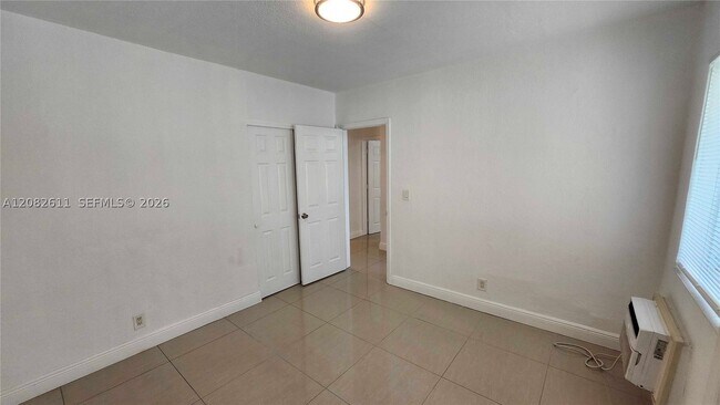 Building Photo - 9770 E Bay Harbor Dr