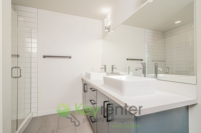 Building Photo - Rooftop Living with Open Concept Design and Parking Included