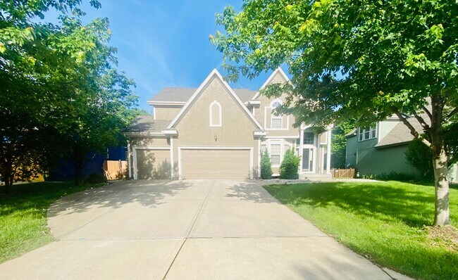 Primary Photo - {15808} Hampton Place Two Story Home + Finished Basement + Three Car Garage + Blue Valley HS
