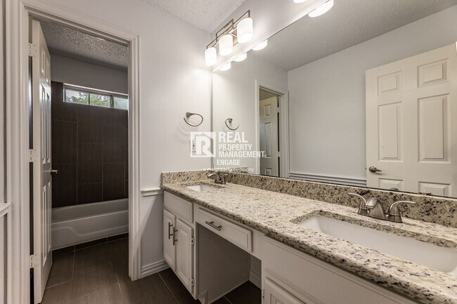 Building Photo - Recently Updated Plano Property with Modern Features and Serene Surroundings