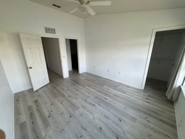 Building Photo - Lake Views. Upgraded Finishes. Gated Commu...