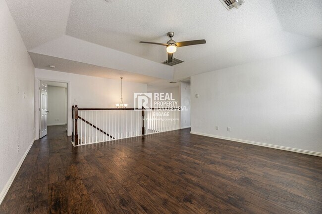 Building Photo - Recently Updated Plano Property with Modern Features and Serene Surroundings