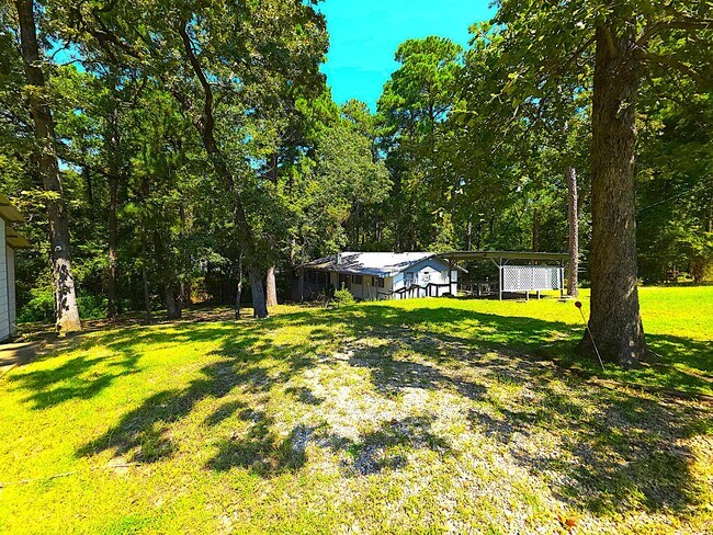 Building Photo - Breathtaking Lake View Retreat with Modern Updates!