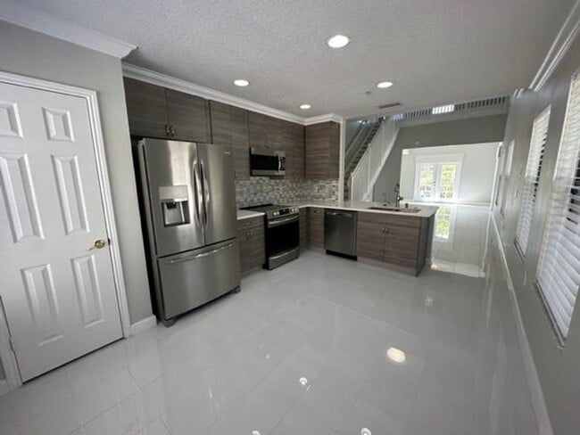Building Photo - Iconic 2 story corner condo at the Terraces of Celebration. Completely renovated 2 Bedroom, 2 Bat...