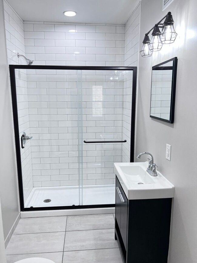 Building Photo - The Duplex on Plumer: Where Modern Meets M...