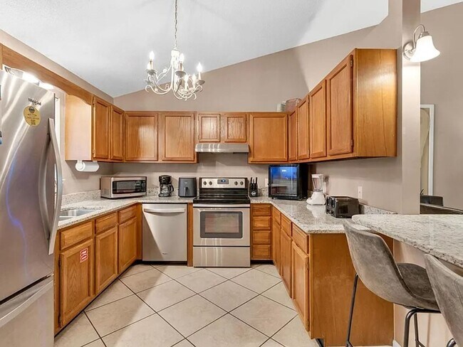Building Photo - Beautiful Condo with Beach Front Access