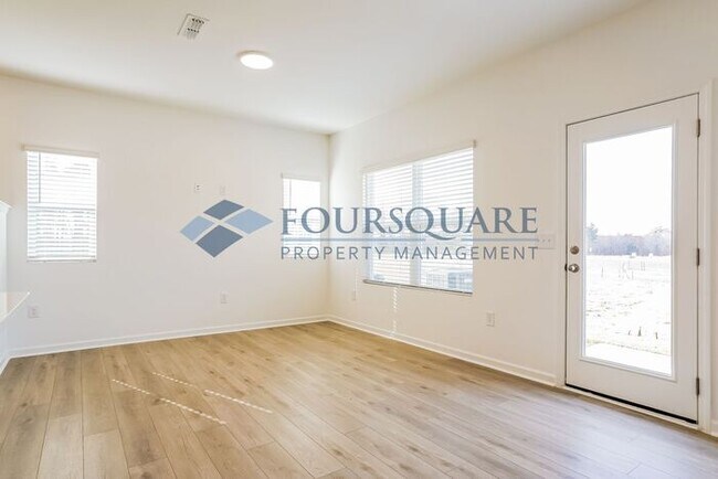 Building Photo - Stylish End-Unit Townhome with Patio & One Car Garage  – Crescent Mills, Clayton