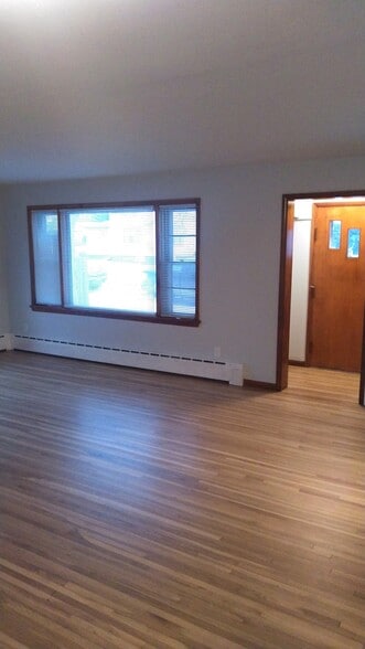 refinished hardwood floor in LR - 515 3rd Ave NW
