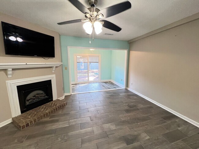 Building Photo - Stunning and Spacious 2 Bedroom, 2.5 Bath, Town Home With Sunroom and Deck!