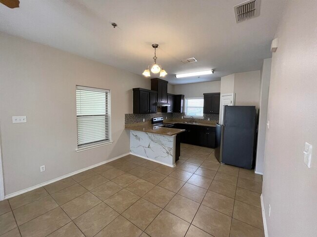 Building Photo - 5402 Marcella Ave