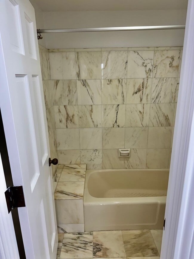 Building Photo - Experience Luxury and Prestige at Yorktown Condominiums