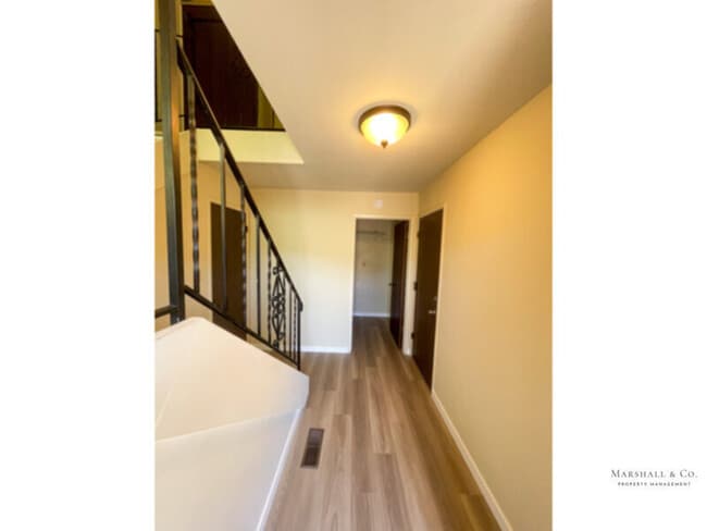 Building Photo - UPDATED AND BEAUTIFUL 2BR/1BA DUPLEX TOWNHOME, NEW WOOD FLOORING, PRIV. ENCLOSED BACK YARD, 2 CAR GA