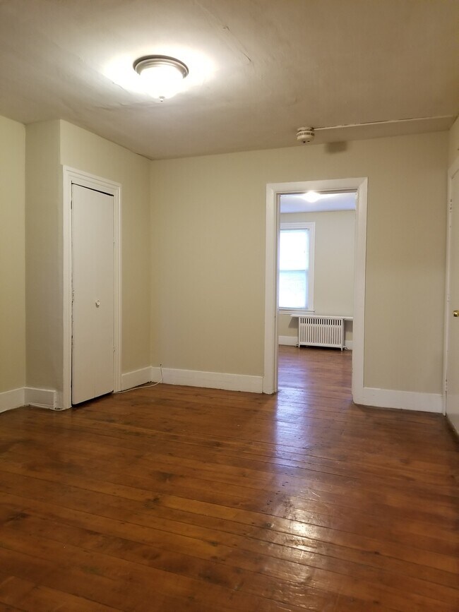 Building Photo - Wood floors, fresh paint, coin laundry, shared yard