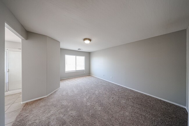 Building Photo - Welcome to this spacious 4 bedroom, 2.5 ba...
