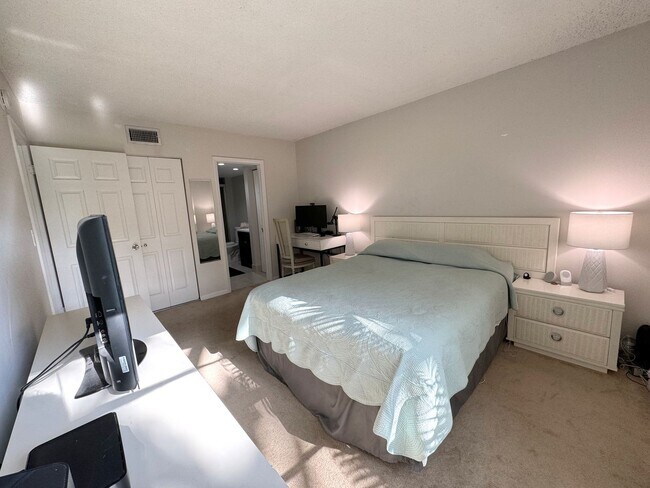Building Photo - 5-Min Walk to FAU – Private Room in Furnished 2/2 Condo w/ Pool & Canal Views – $1550