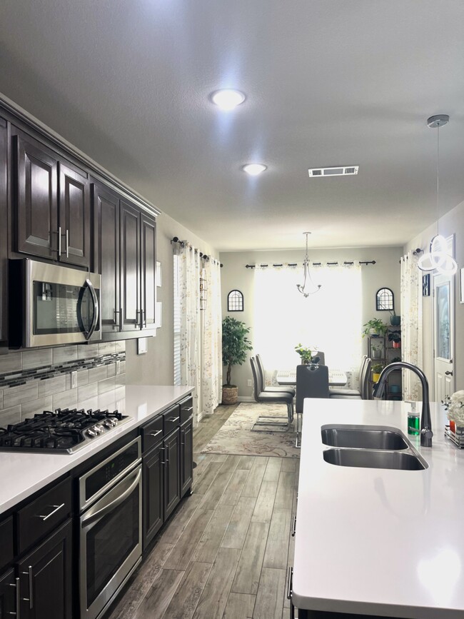 Kitchen and Dinning view - 7329 Howling Coyote Ln