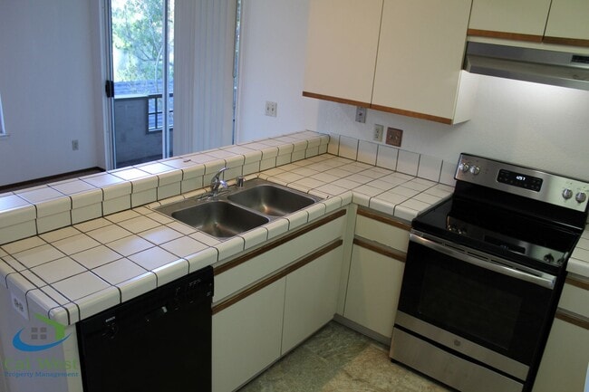 Building Photo - $2,695 - Upstairs 2 Bedroom/1 Bath Condo