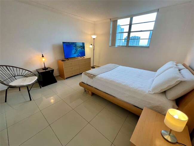 Building Photo - 19390 Collins Ave