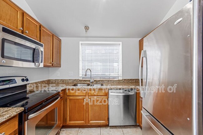Building Photo - 5704 E Aire Libre Ave