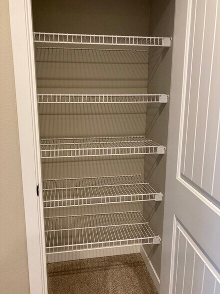 Hall closet - 608 E Taylor Dr