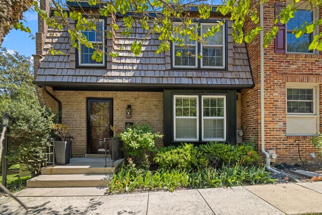 Building Photo - Completely Renovated Corner Townhome with Modern Kitchen, Designer Baths, and Private Yard