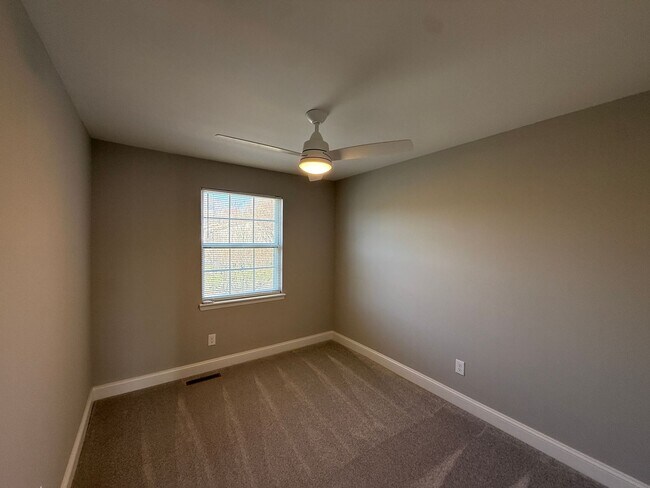 Building Photo - New Everything 4BR Townhome with Private Lower Level Suite | Stainless Kitchen | LVP + New Carpet...