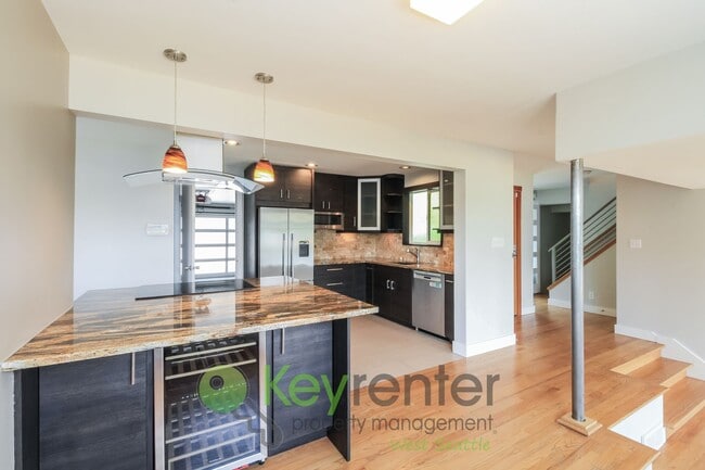 Building Photo - Waterfront Elegance with Private Dock and Designer Finishes