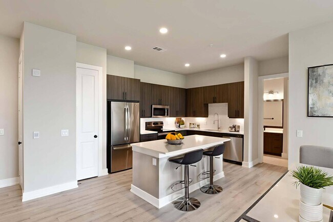 Cook and entertain with ease in a sleek, modern kitchen built for both style and function. - Windsor Burnet