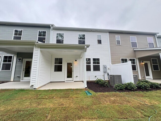 Building Photo - BRAND NEW GORGEOUS TOWNHOUSE in a very con...