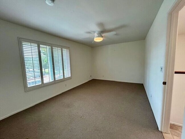 Building Photo - Lovely Two Story Villa Pino Condo - Availa...