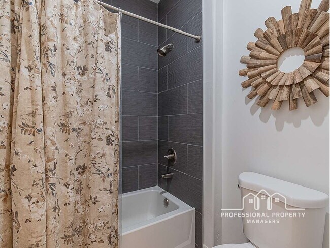 Building Photo - “Modern 4-Bedroom, 2-Bathroom Solar Home in El Rancho”
