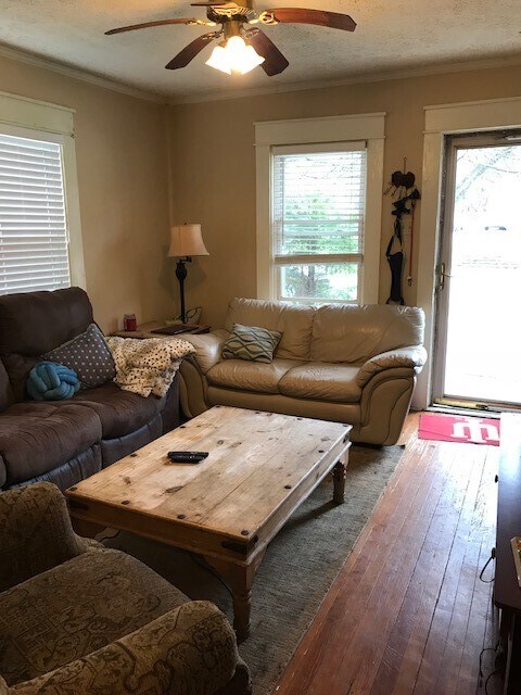 living room with furniture - 210 E Vermilya Ave