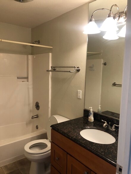 Bath with shower combo. Granite counter top - 12511 98th Ave Ct SW