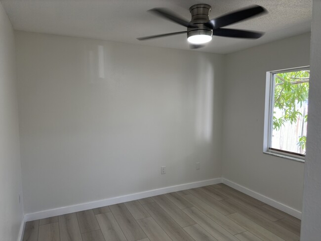 Building Photo - Remodeled 4-bedroom 2 bath 2 car garage in...