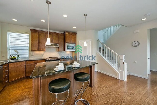 Building Photo - For Rent: 3 Bedroom, 3 Bathroom Home with Den