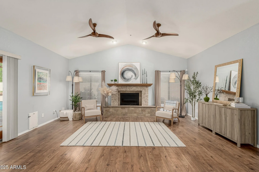 Staged, but we put a large sectional and TV above the fireplace - 4747 N 84th Way