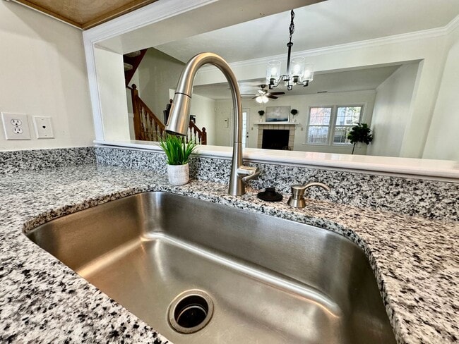 Building Photo - 3-Bedroom Townhome Ready NOW!! Completely Updated - Fenced Backyard - Exterior Storage!