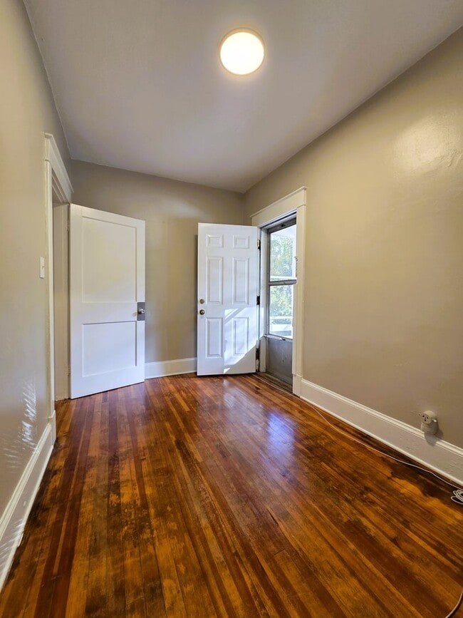 Building Photo - Renovated stately brick home in Forest Hill area on large lot.