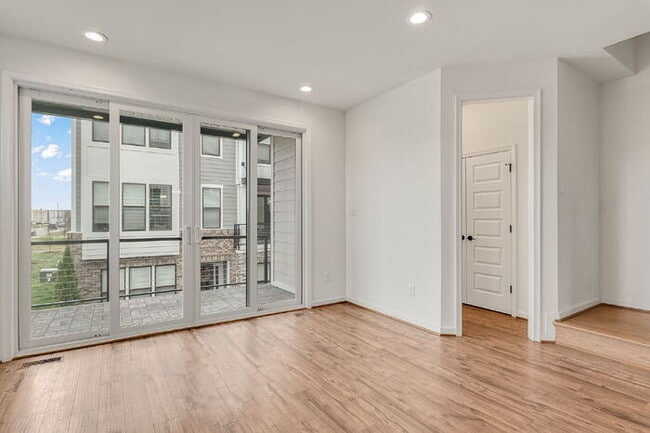 Building Photo - Modern End-Unit Townhome in Rocketts Landing with an Incredible Rooftop Terrace