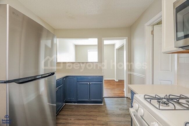 Building Photo - Professionally Renovated Brick Ranch with Designer Kitchen - Ready to Move-In!