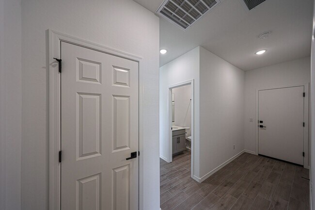 Building Photo - Modern Mountainside Living: Stunning New 4-Bedroom Home in Estrella Crossing! 3 CAR GARAGE!
