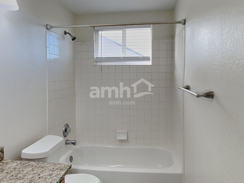 Building Photo - 14592 E 52nd Ave