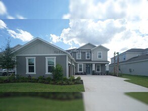 Building Photo - Stunning 5-Bedroom Lakeview Home in River Landing, Wesley Chapel